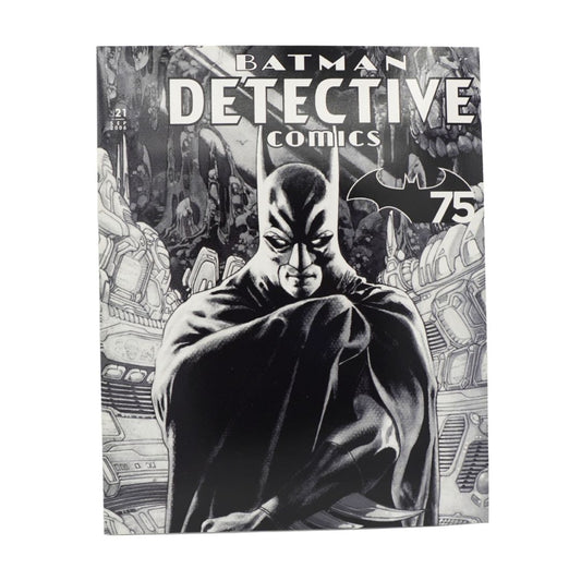 A vintage copy of Batman Detective Comics issue #75, featuring a black and white cover illustration of Batman in a crouched pose against a detailed cityscape background.