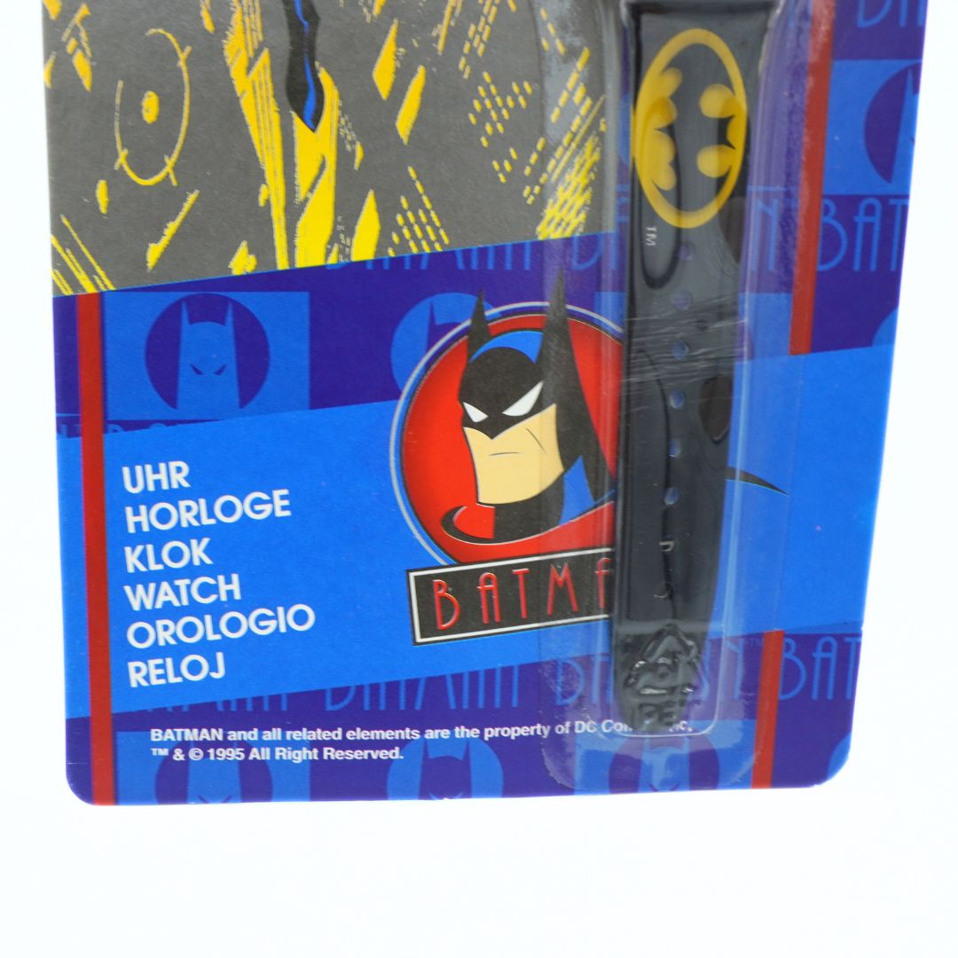 Batman-themed watch packaging with blue and yellow design