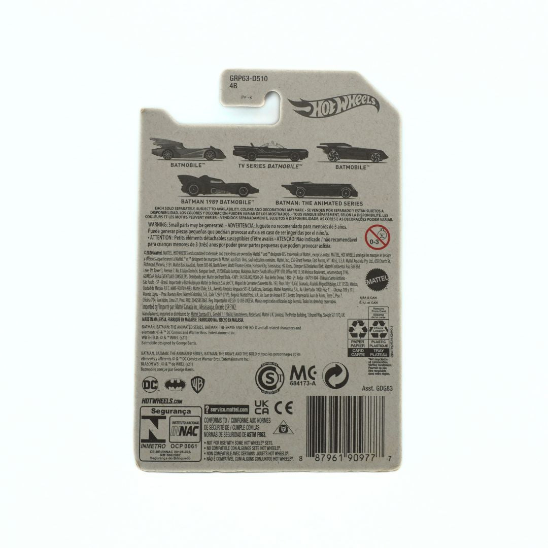 Back view of a Hot Wheels Batman 1989 Batmobile toy car packaging on a white background