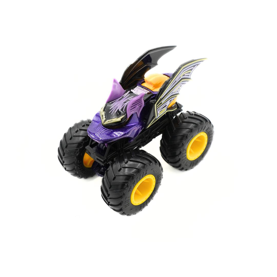 A toy monster truck with a purple and black body, yellow wheels, and bat-wing graphics, photographed on a plain white background.