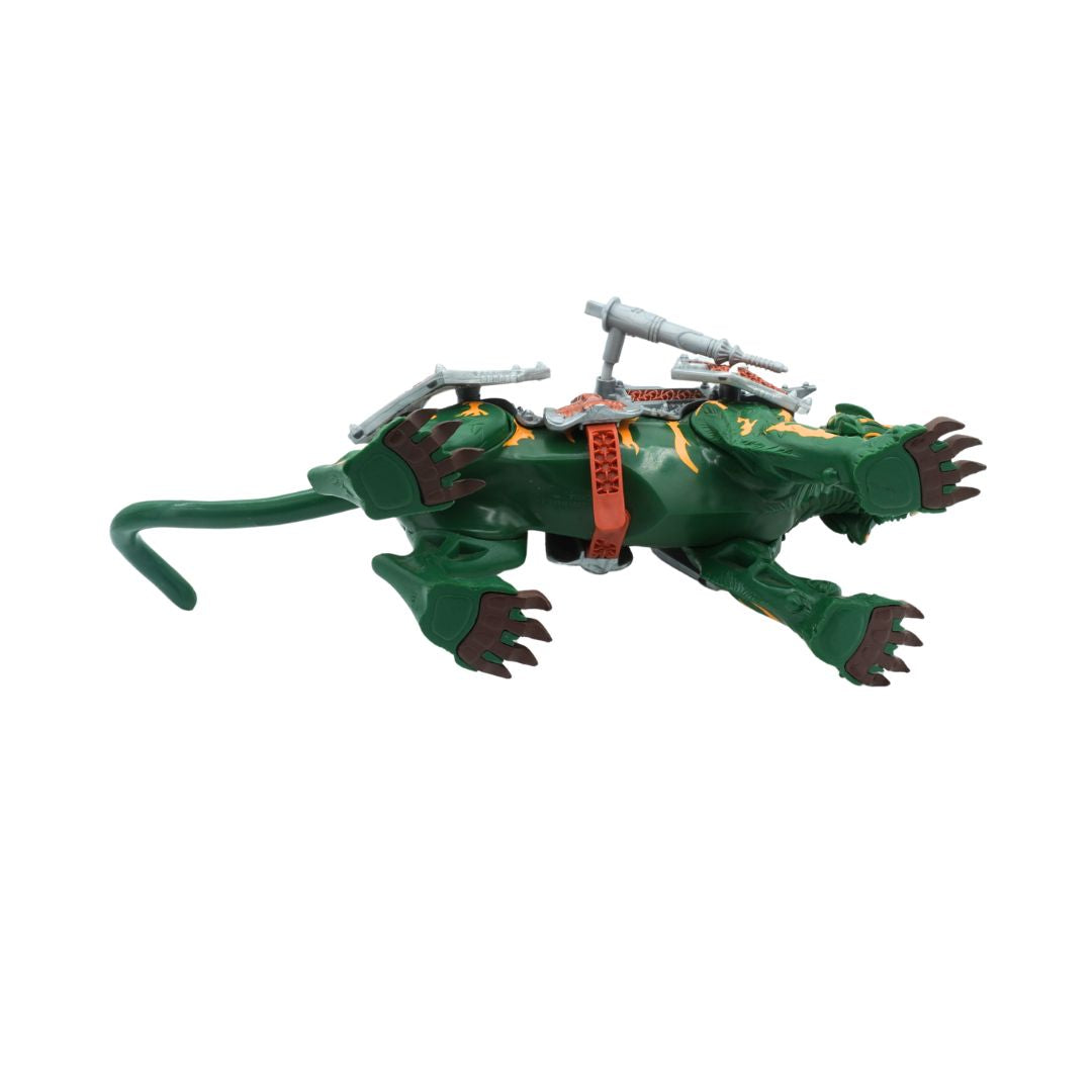 Underside of a vintage green Battlecat toy