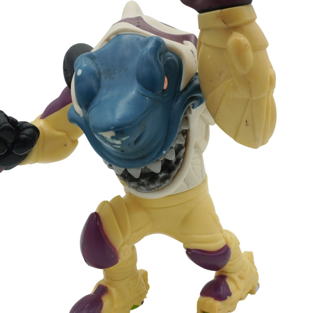 Toy figure with a blue face and yellow body on a white background