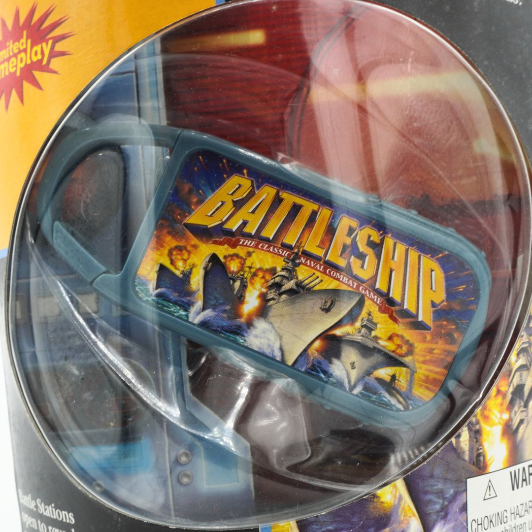 Battleship game packaging with clear lid showing game box design.