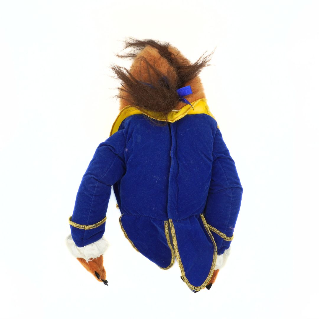 Blue animal costume with brown fur on a white background