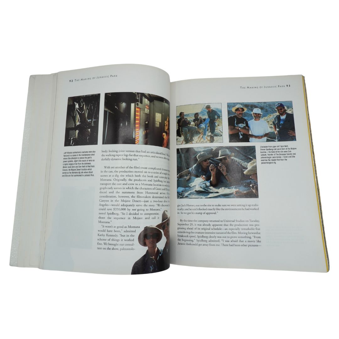Open book with images and text on a white background