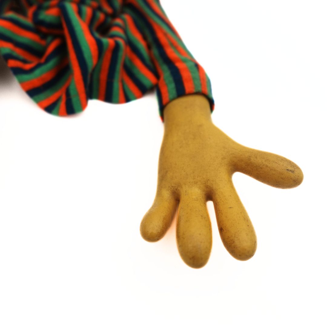 Photo of the palm on a yellow 1970's Sesame Street Bert Puppet