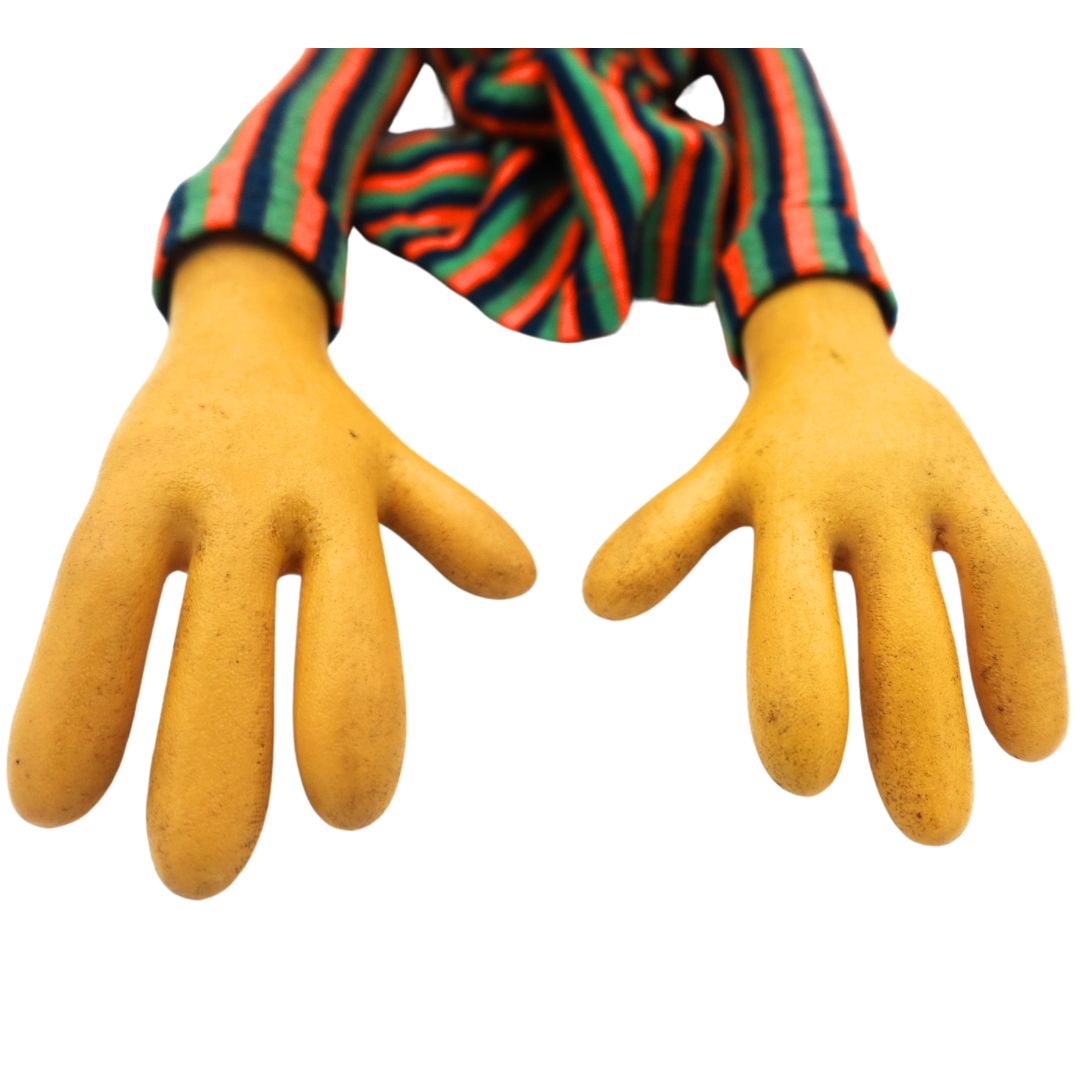 Closeup of the Sesame Street Bert puppet hands, showing each hand with four fingers