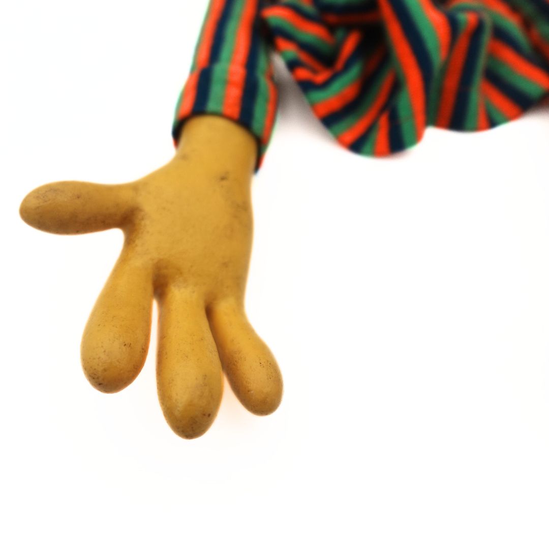 Photo of the palm on a yellow 1970's Sesame Street Bert Puppet