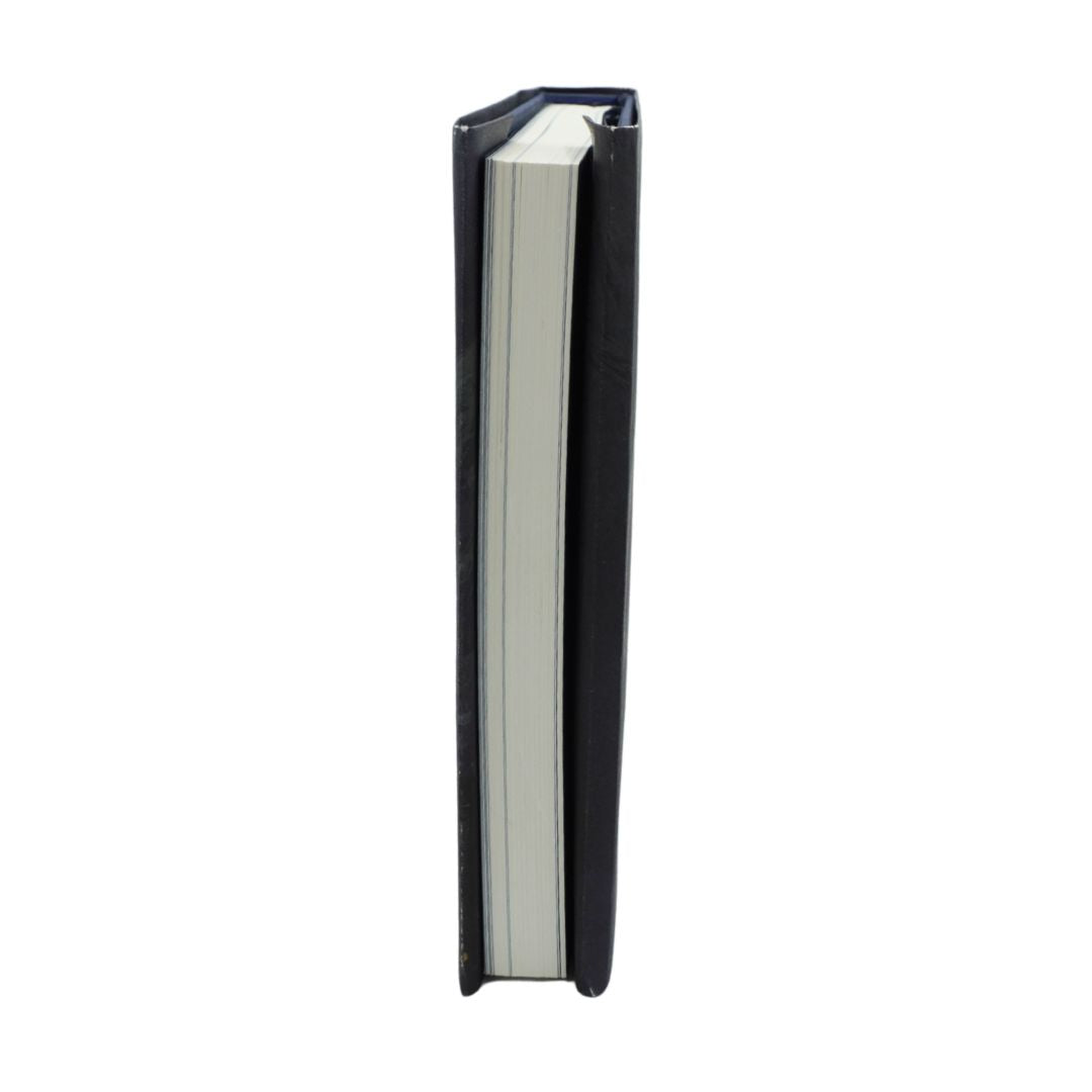 A slim black notebook or journal standing vertically, showing a thick stack of white pages, isolated on a white background.
