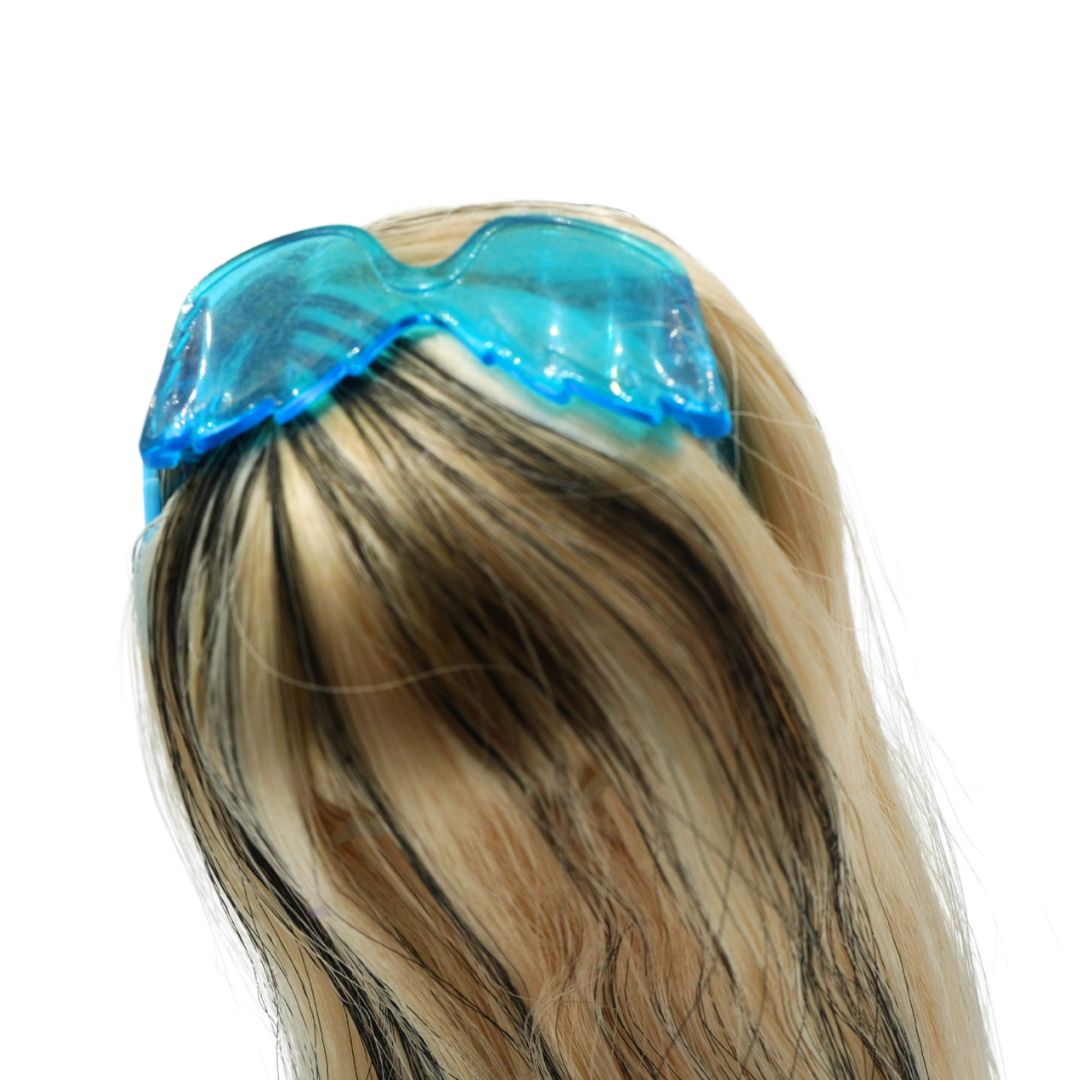 A close-up of a person's blonde and brown hair wearing a translucent blue protective headband or hair cover against a plain white background.