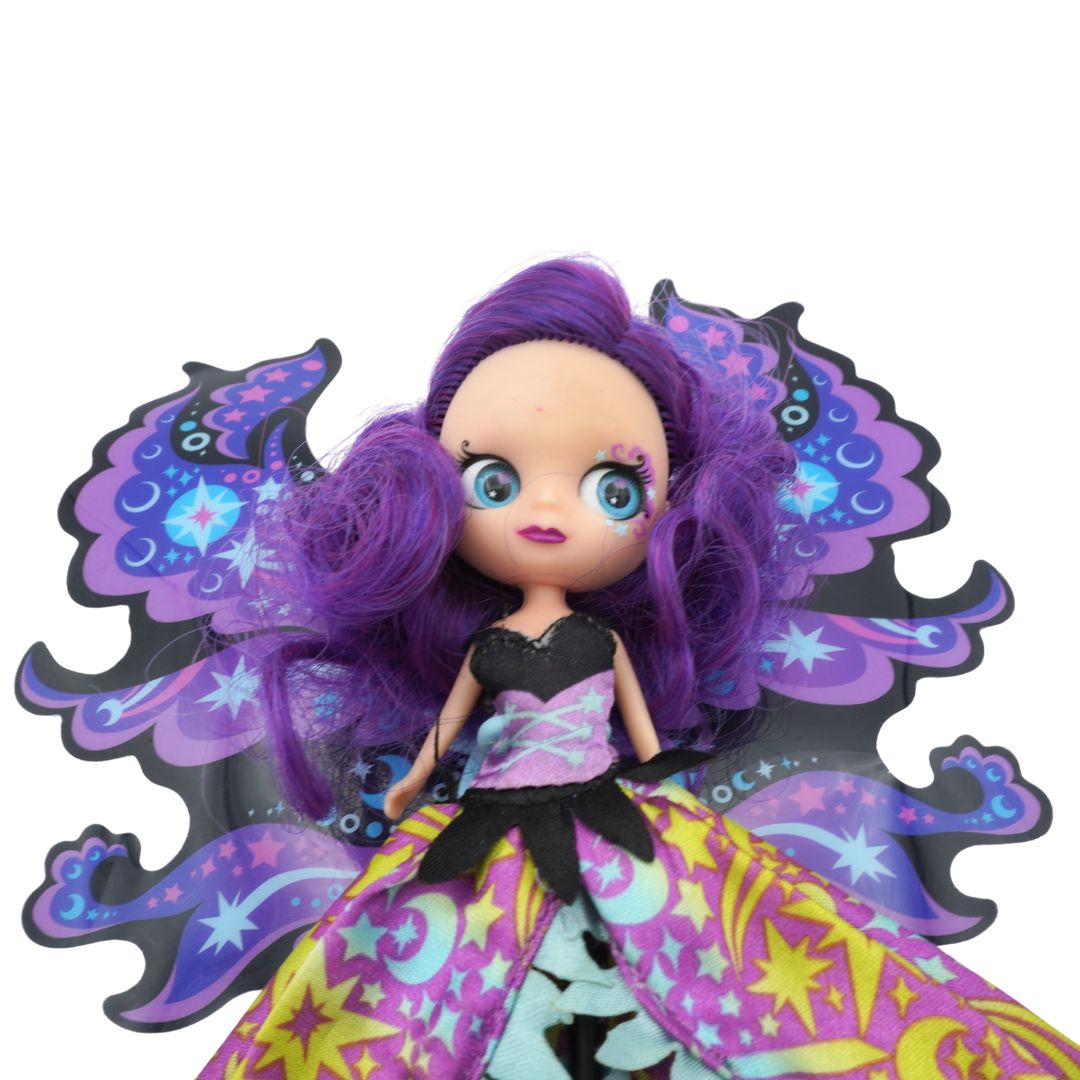 Colorful doll with purple hair and a decorative background