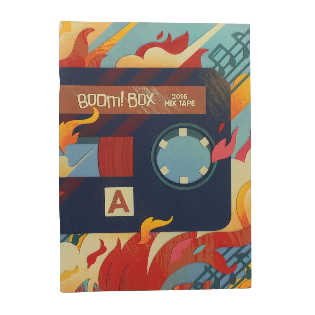 A book featuring a stylized cassette tape illustration with the text 'Boom! Box 2016 Mix Tape' on a colorful abstract background with red, orange, yellow, and blue tones.