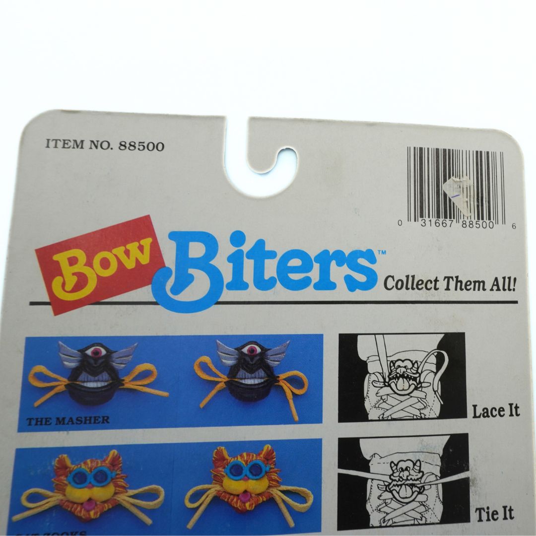 Packaged product with 'Bow Biters' branding and illustrations on a white background