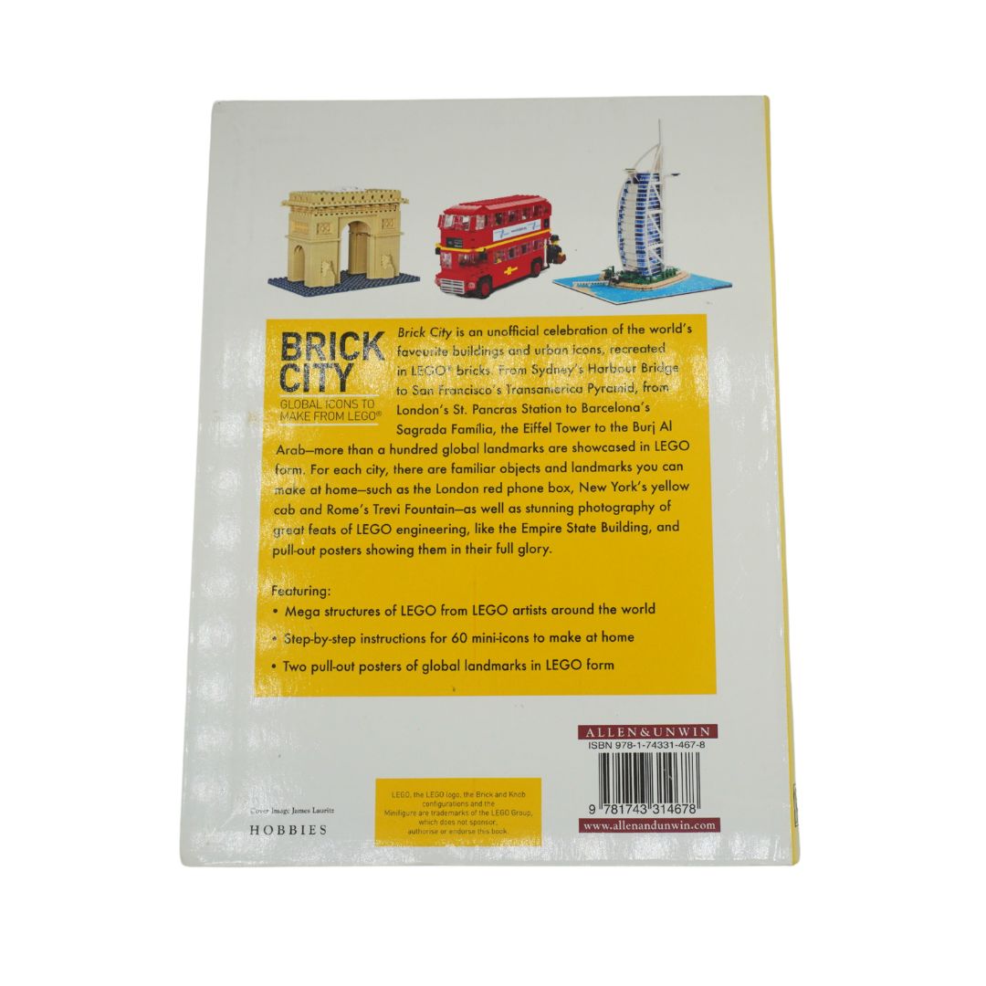 Back cover over a white and yellow book called Brick City