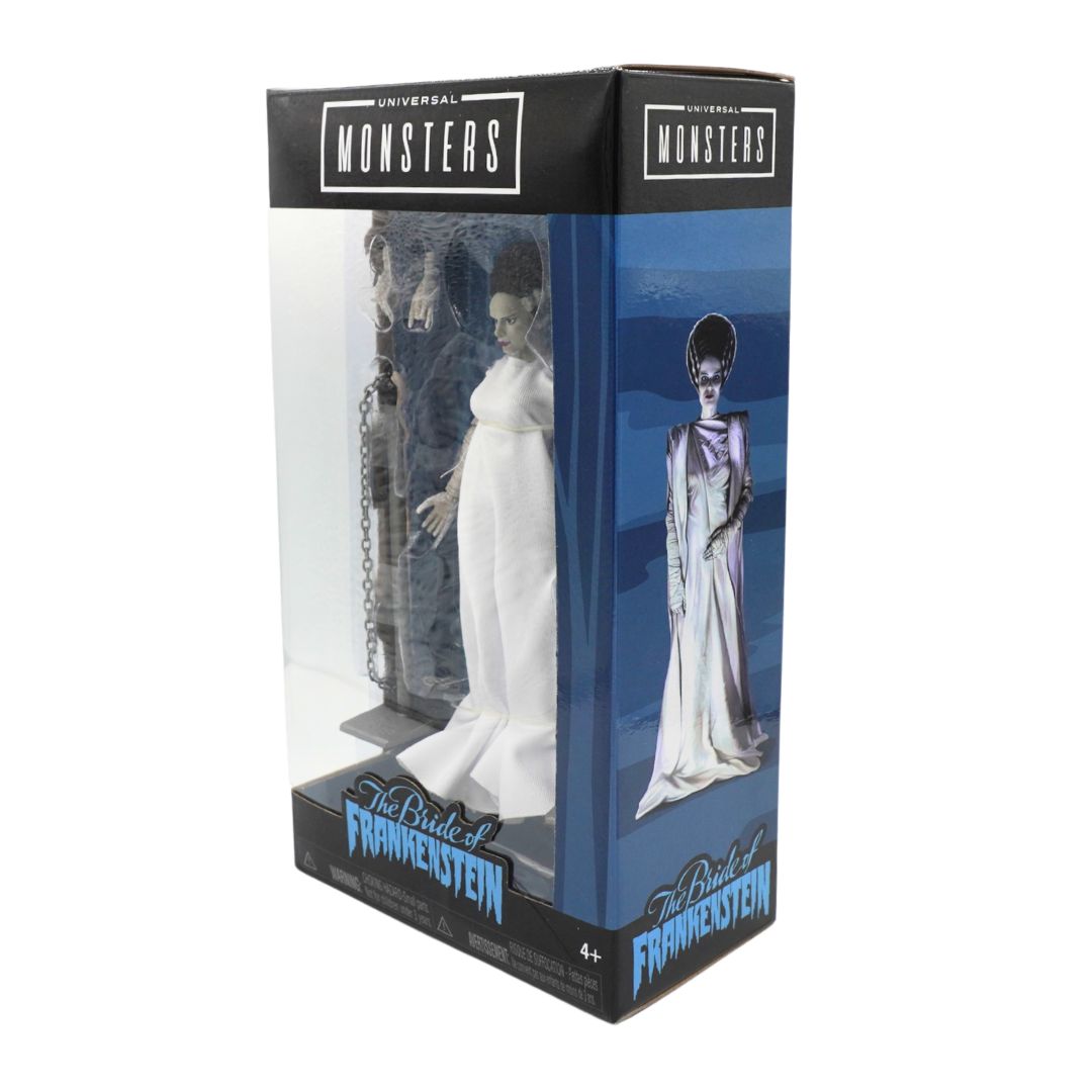 Universal Monsters The Bride of Frankenstein action figure in its original window box packaging, featuring a white gown figure and blue illustrated box design.