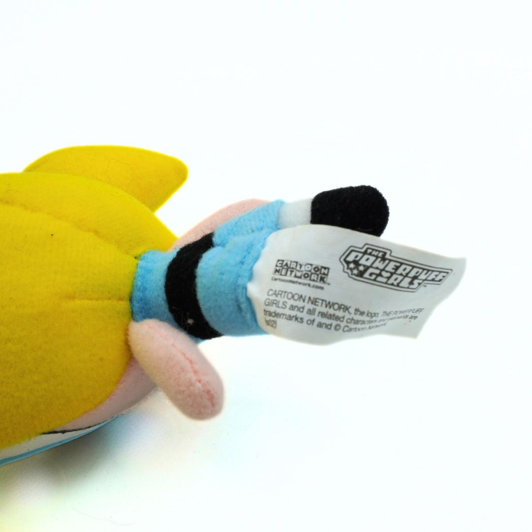 Plush toy with a visible brand label on a white background