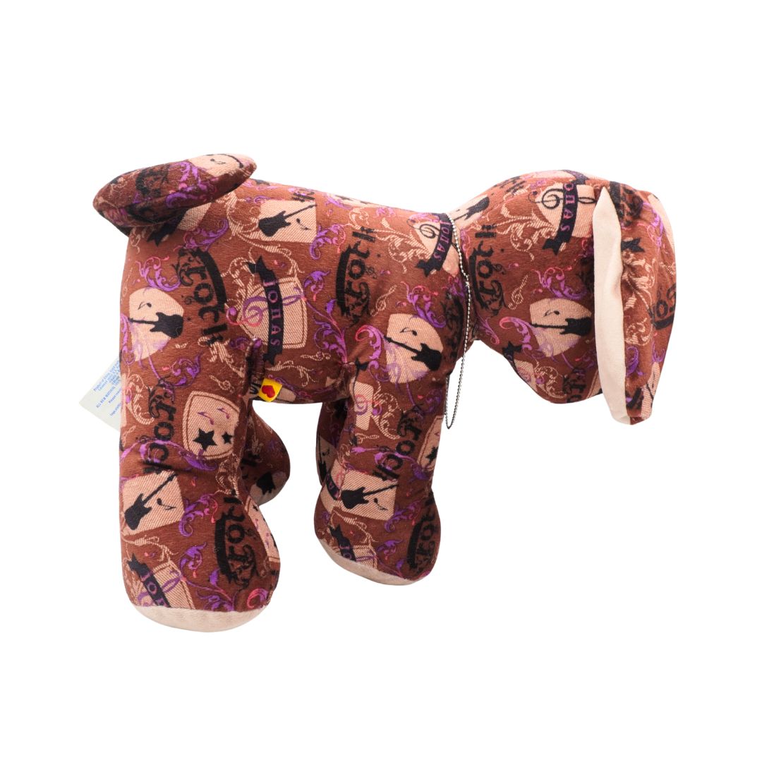 Plush dog toy with pattern on a white background