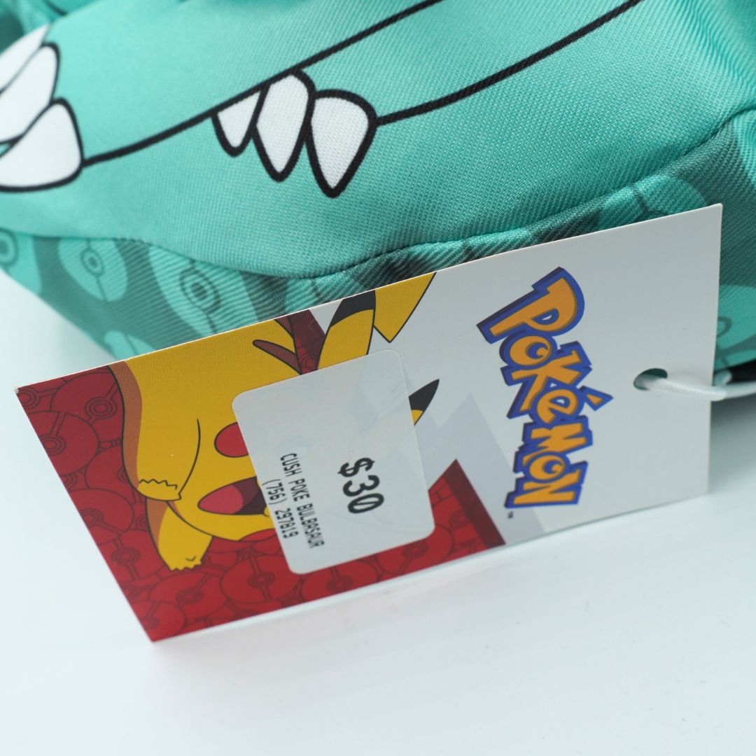 Close-up of a Pokémon branded product with a price tag on a white background