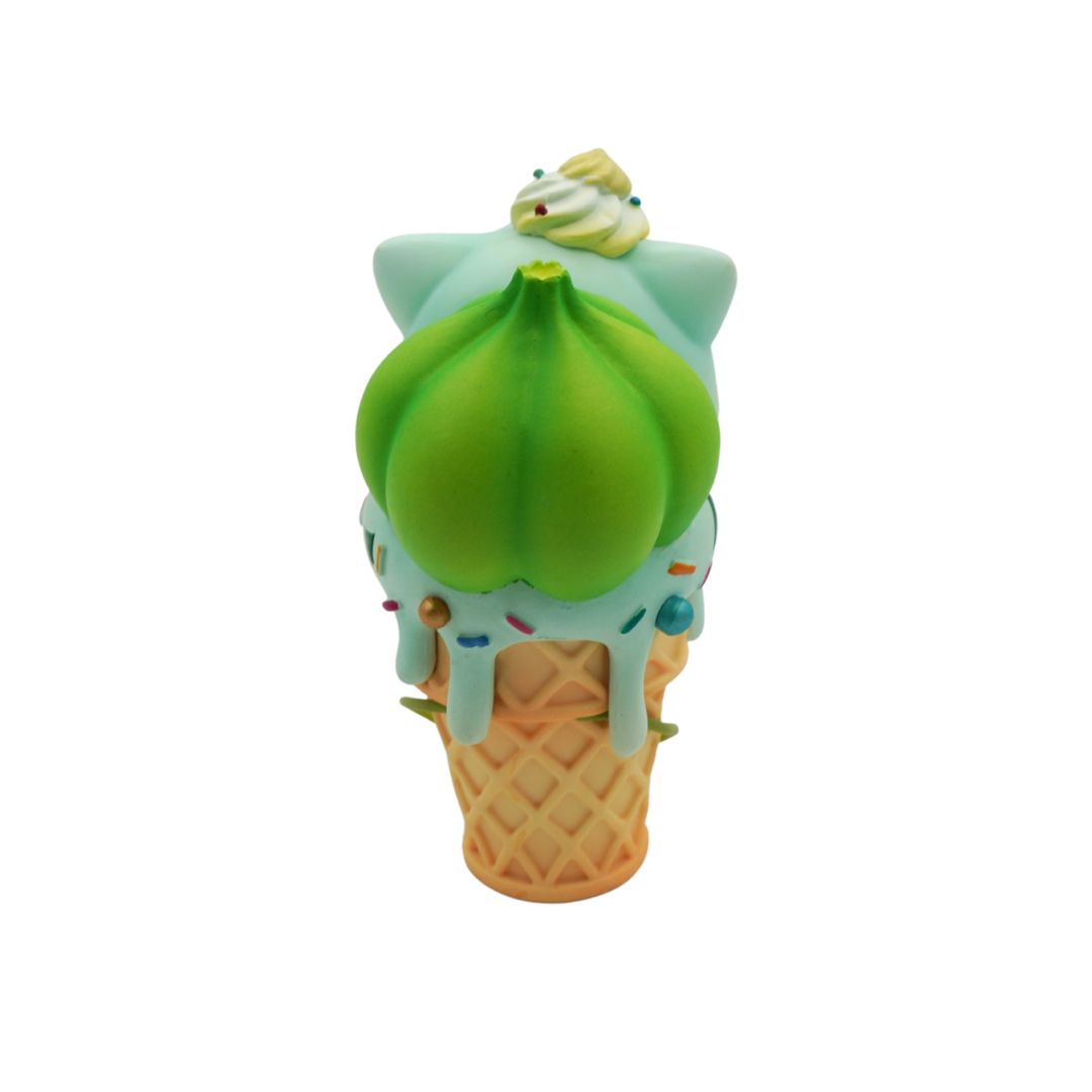 Toy resembling a green ice cream cone with a character on top against a white background