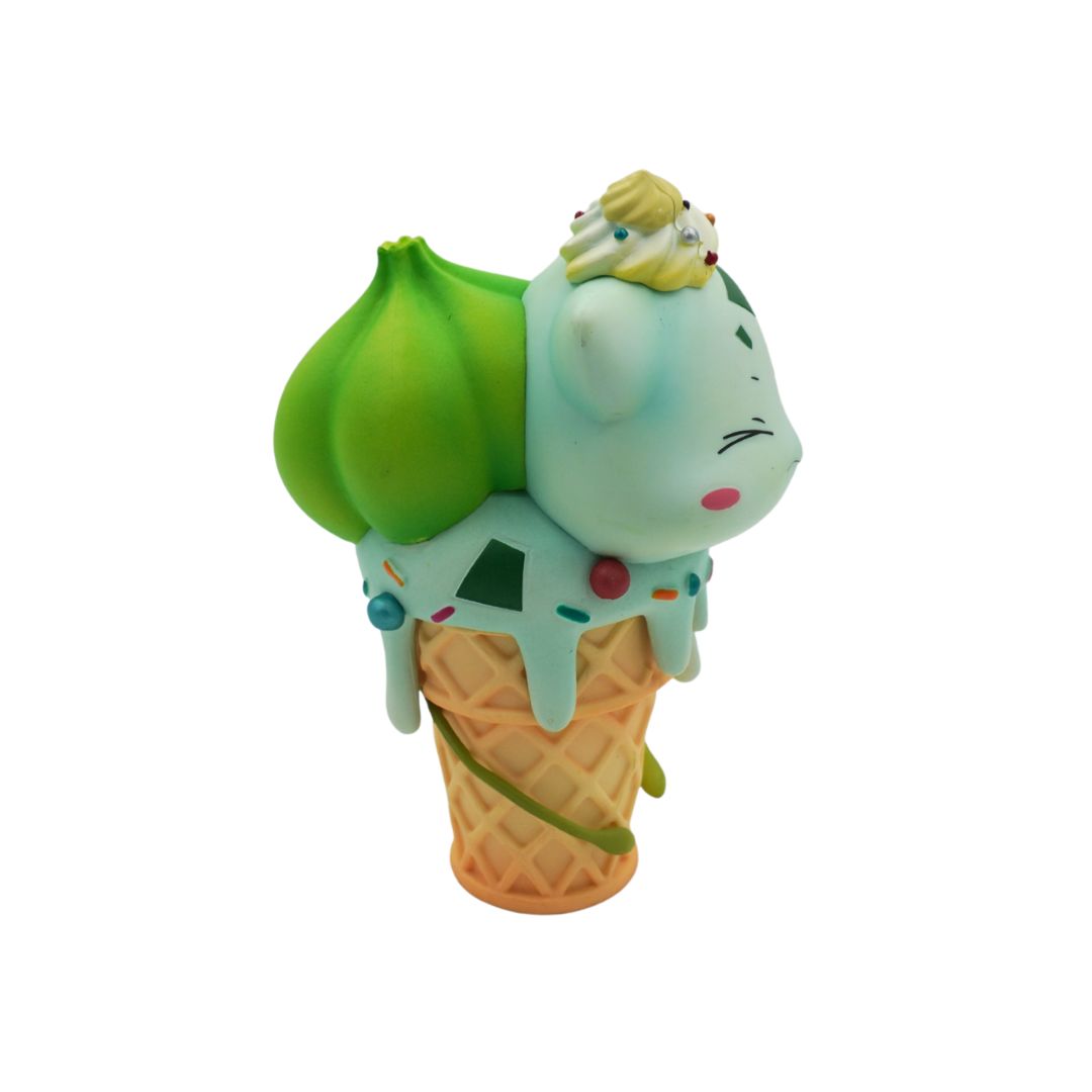 Toy figure of a character in an ice cream cone with green top and waffle base on a white background