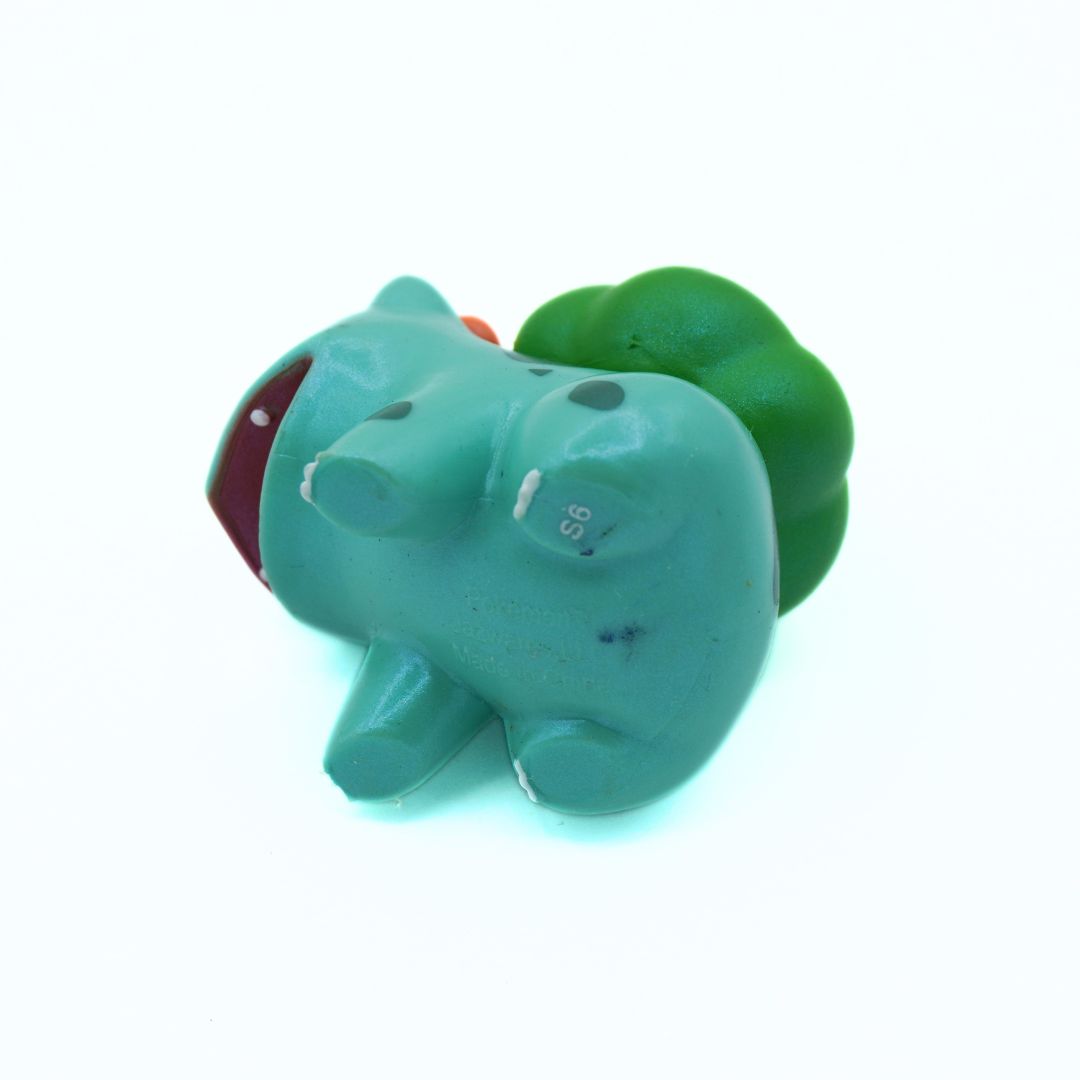 Underside of a green Bulbasaur figure