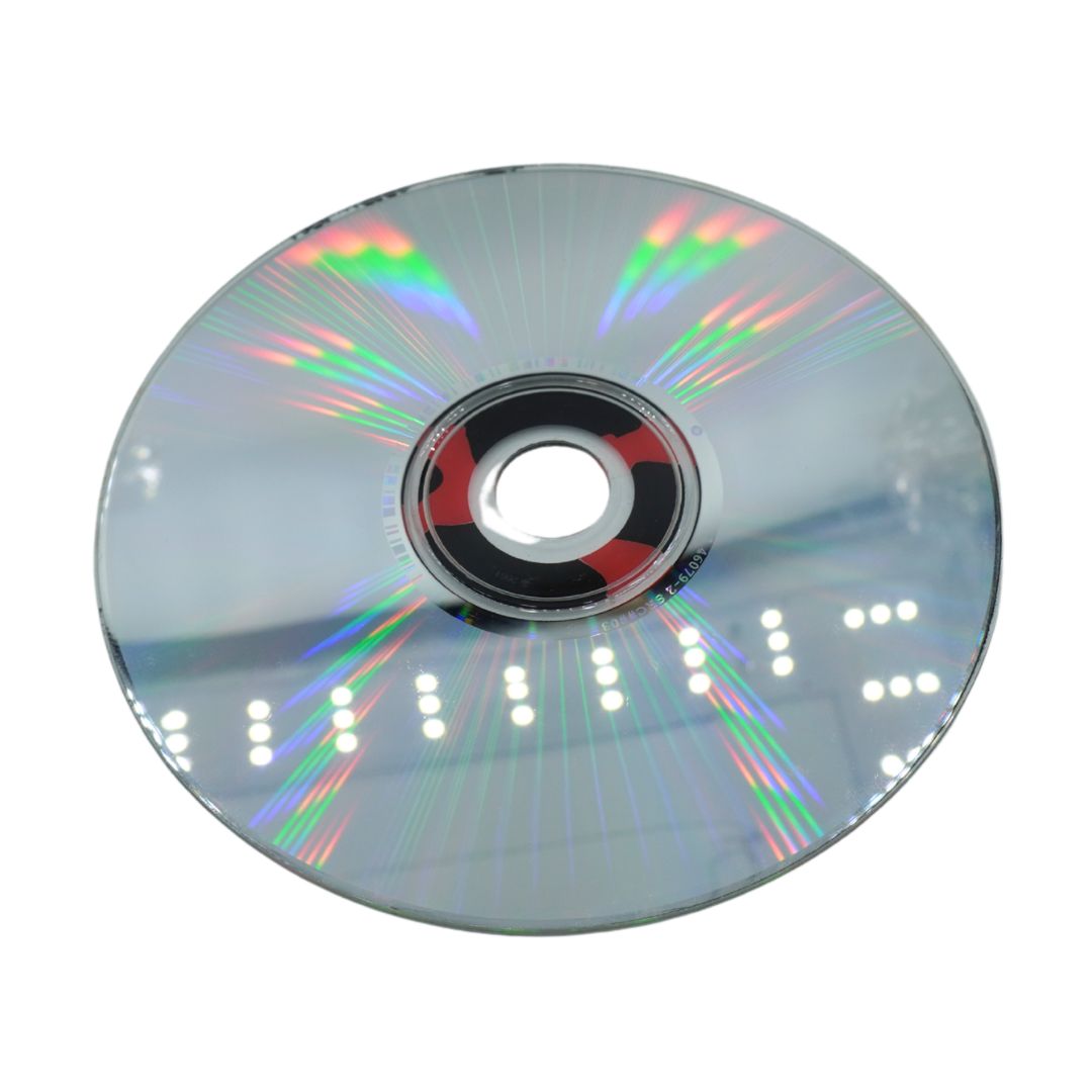 A blank silver CD-R disc with rainbow reflective patterns, shown from the top on a plain white background.
