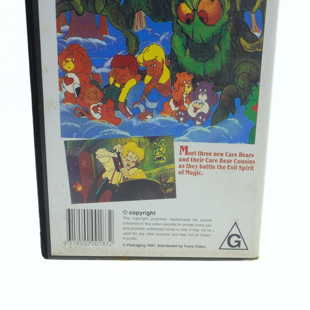 Back cover of a video game case featuring Care Bears and Care Bear Cousins with colorful graphics.