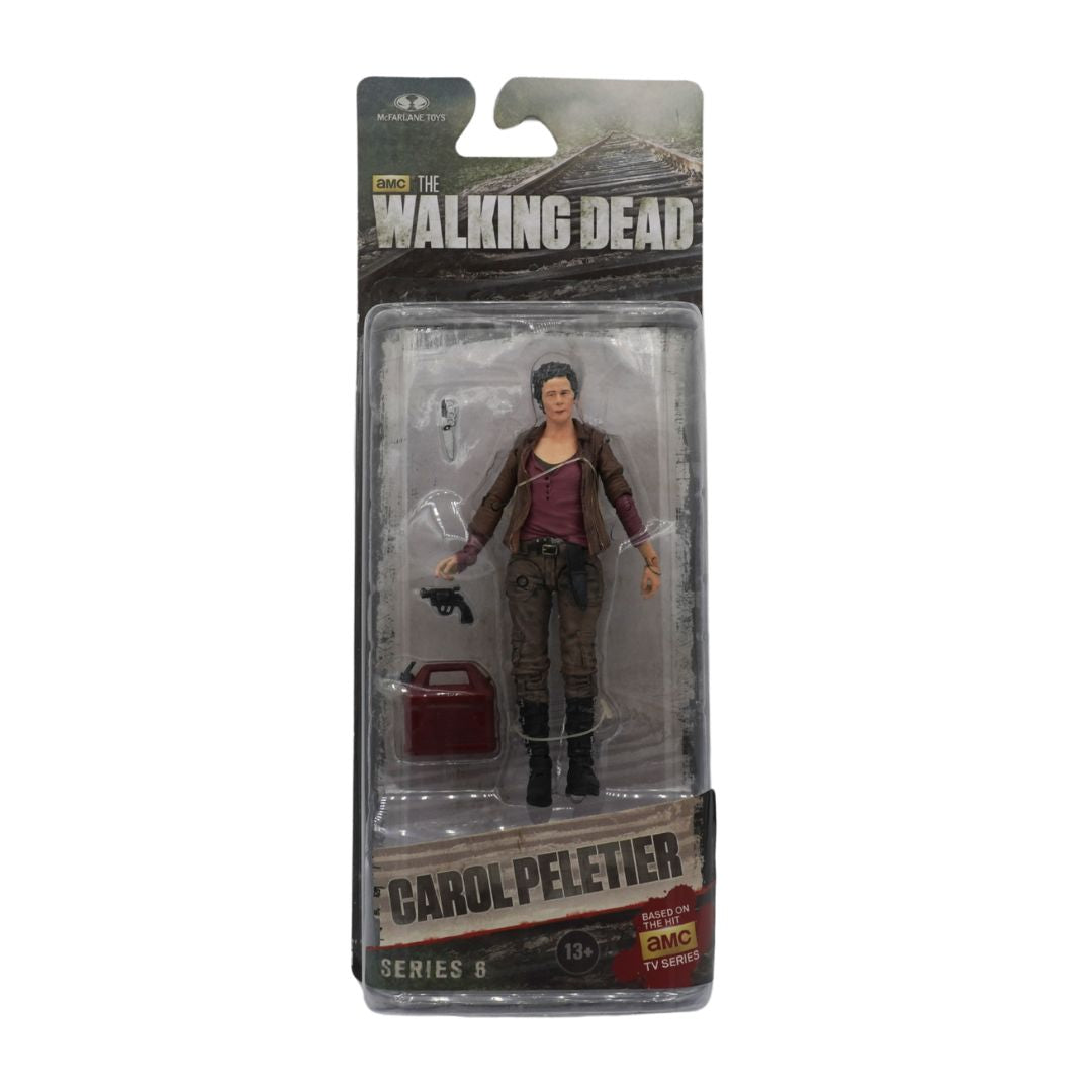 Action figure of Carol Peletier from 'The Walking Dead' in packaging on a white background