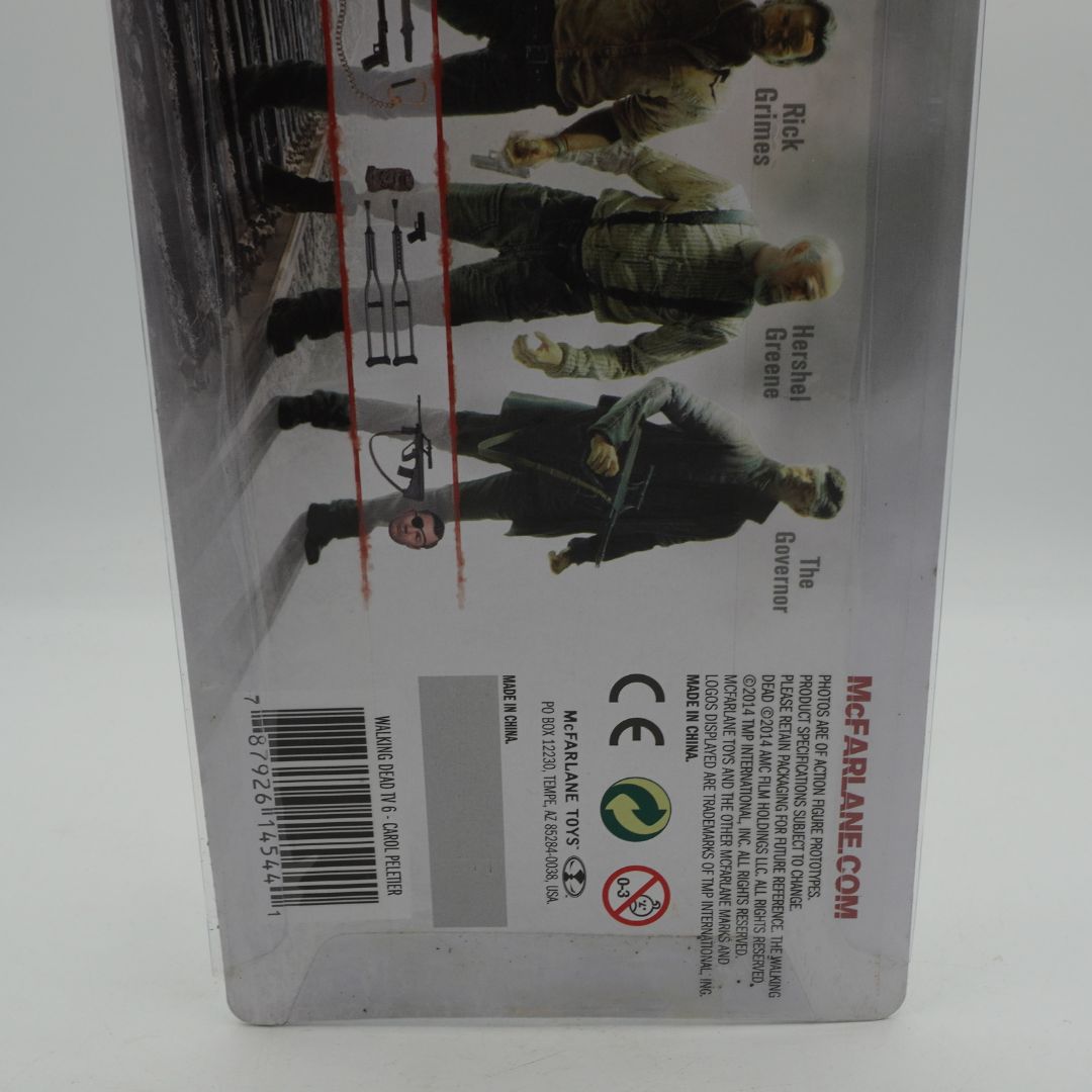 Back of a toy packaging featuring characters and branding on a white background