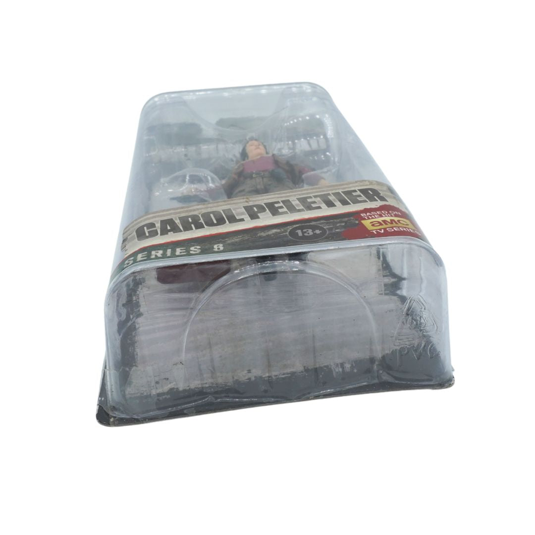 Packaged toy figure of Carol Peletier from 'The Walking Dead' series 6 on a white background