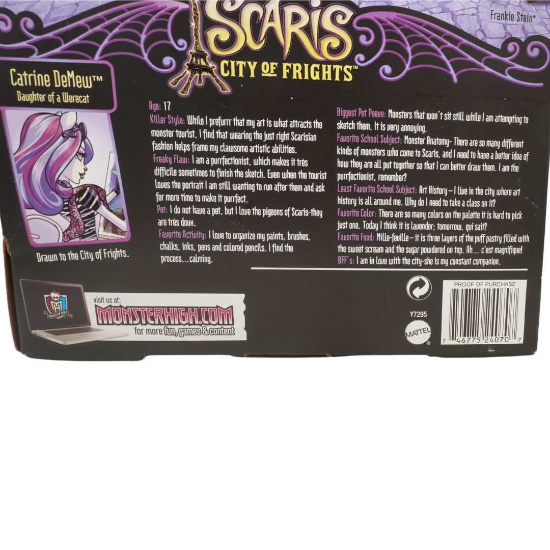 Back of a toy packaging with 'Monster High' branding and character details.