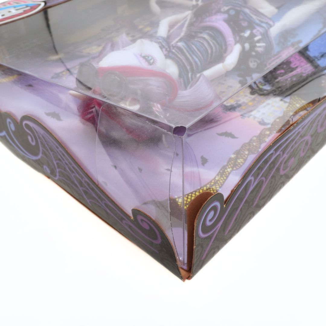 Toy figure in a clear plastic packaging with decorative elements