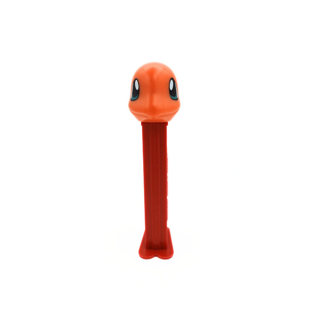 Front on photo of a Charmander Pez dispenser with a red body and an orange head