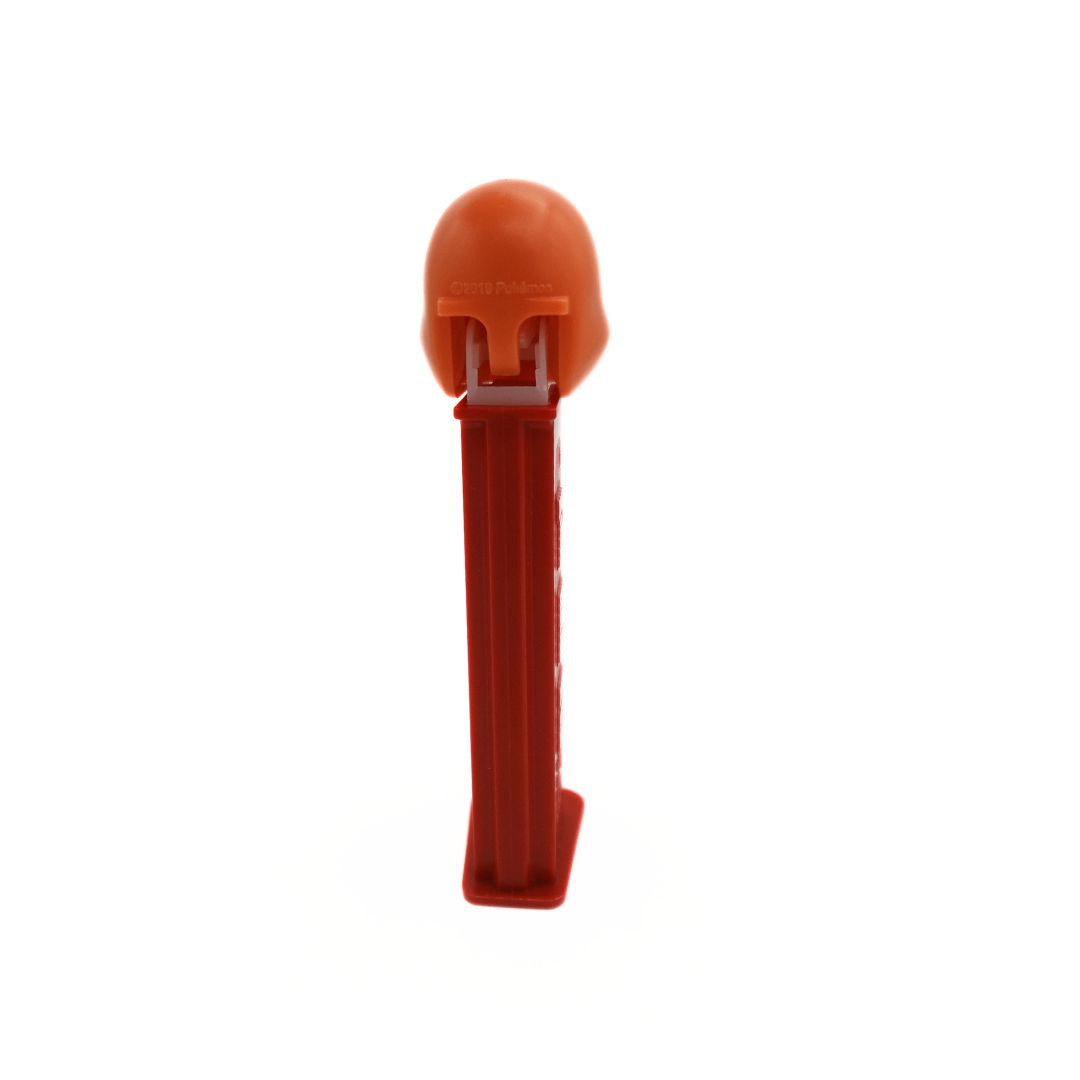 Photo of the back of a Charmander Pez dispenser with a red body and an orange head