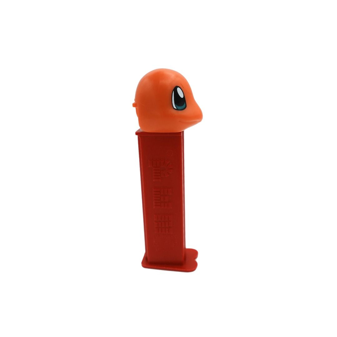 Side on photo of a Charmander Pez dispenser with a red body and an orange head