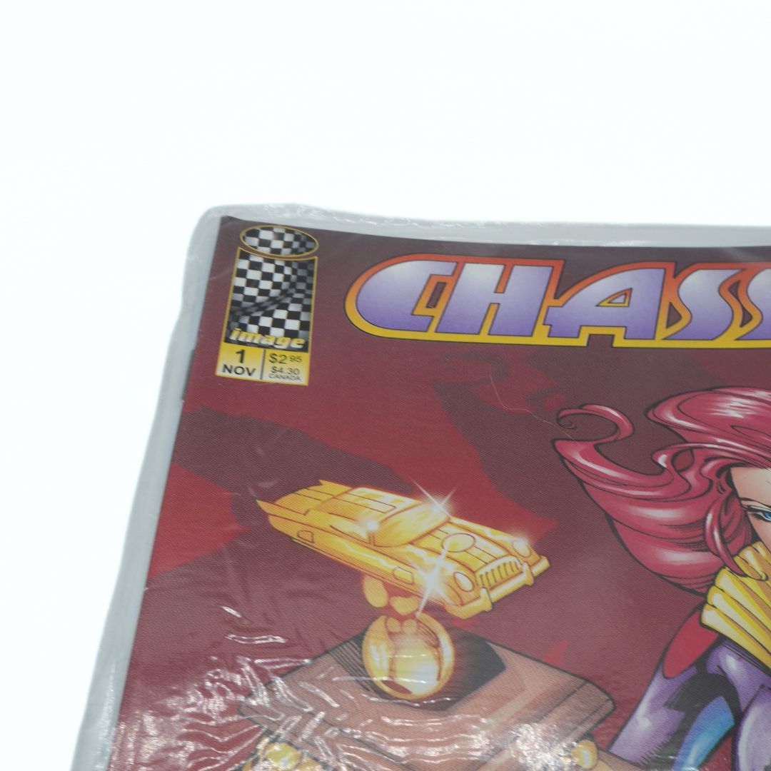 Comic book with a gold car on the cover, featuring the word 'Chassis'