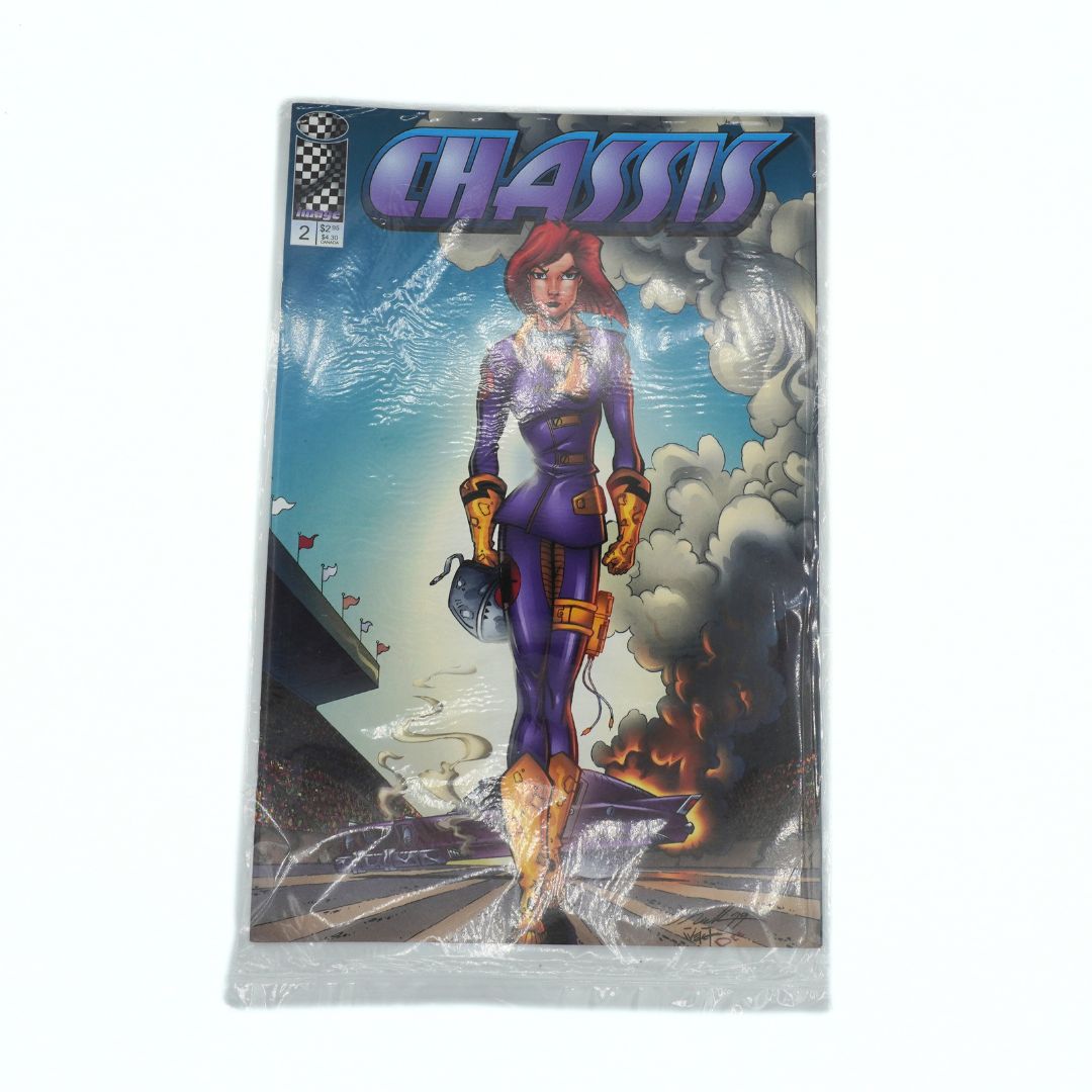 Comic book titled 'Chassis' with a character on the cover, sealed in plastic wrap.
