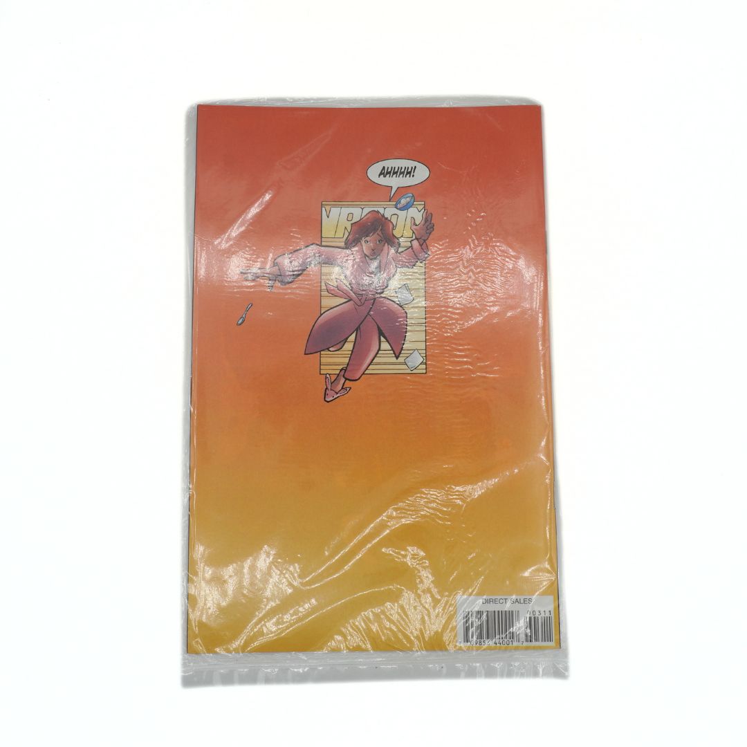 Comic book with a character on the cover, wrapped in plastic on a white background