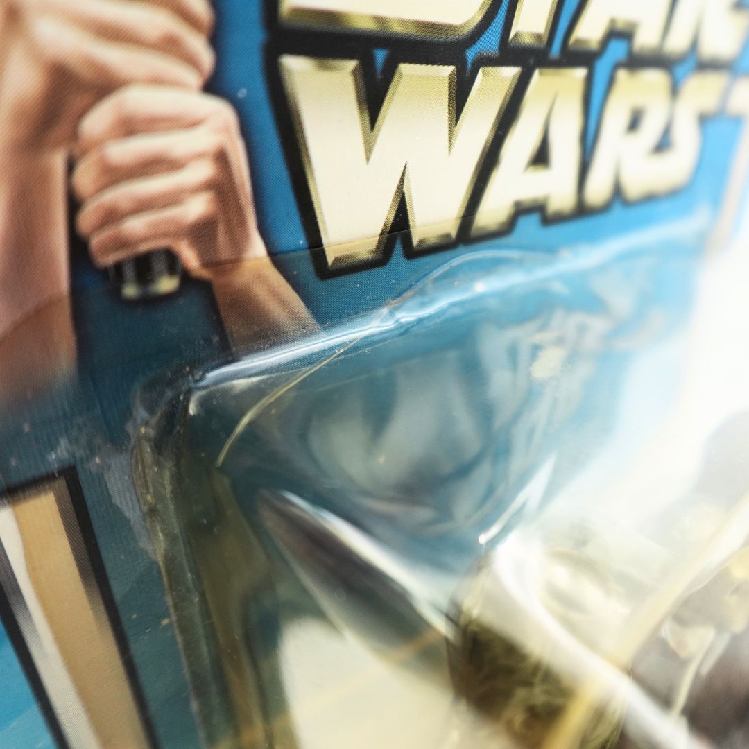 Ultra close up photo of a Chewbacca Cloud City packaging with some loose glue