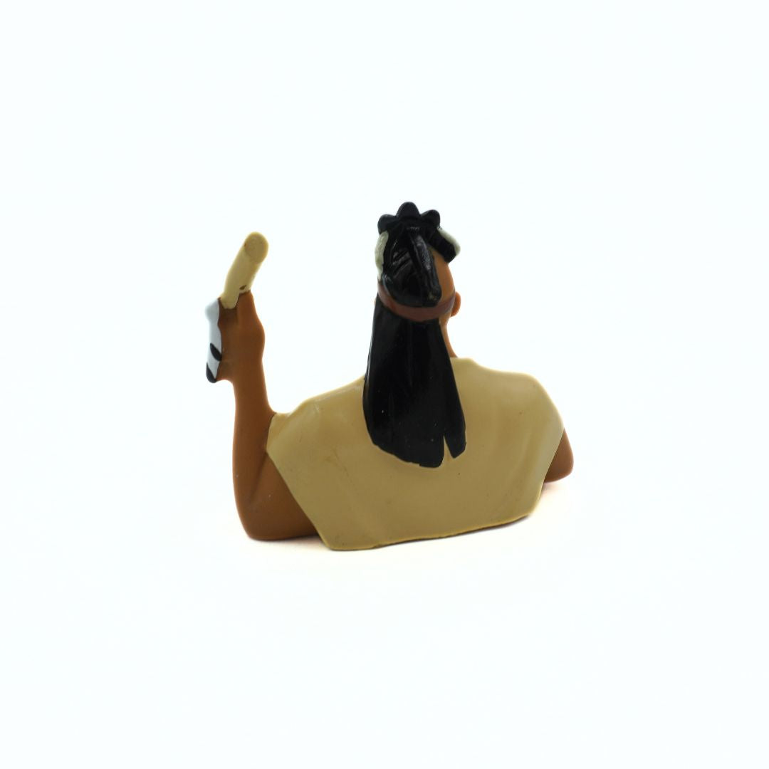 Small figurine of a horse with a white blaze on a white background