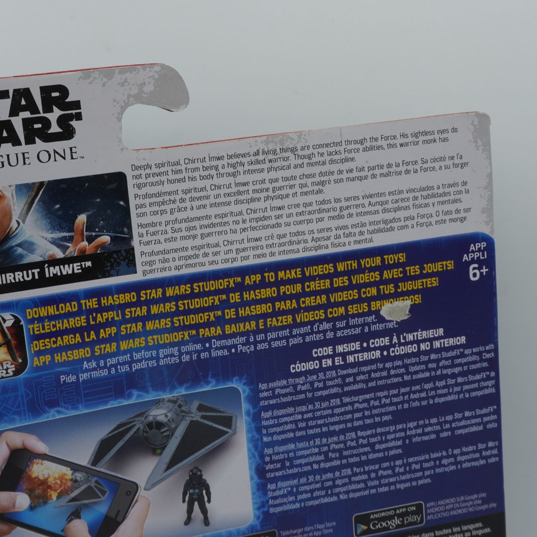 Back of a Star Wars toy packaging with text and images.