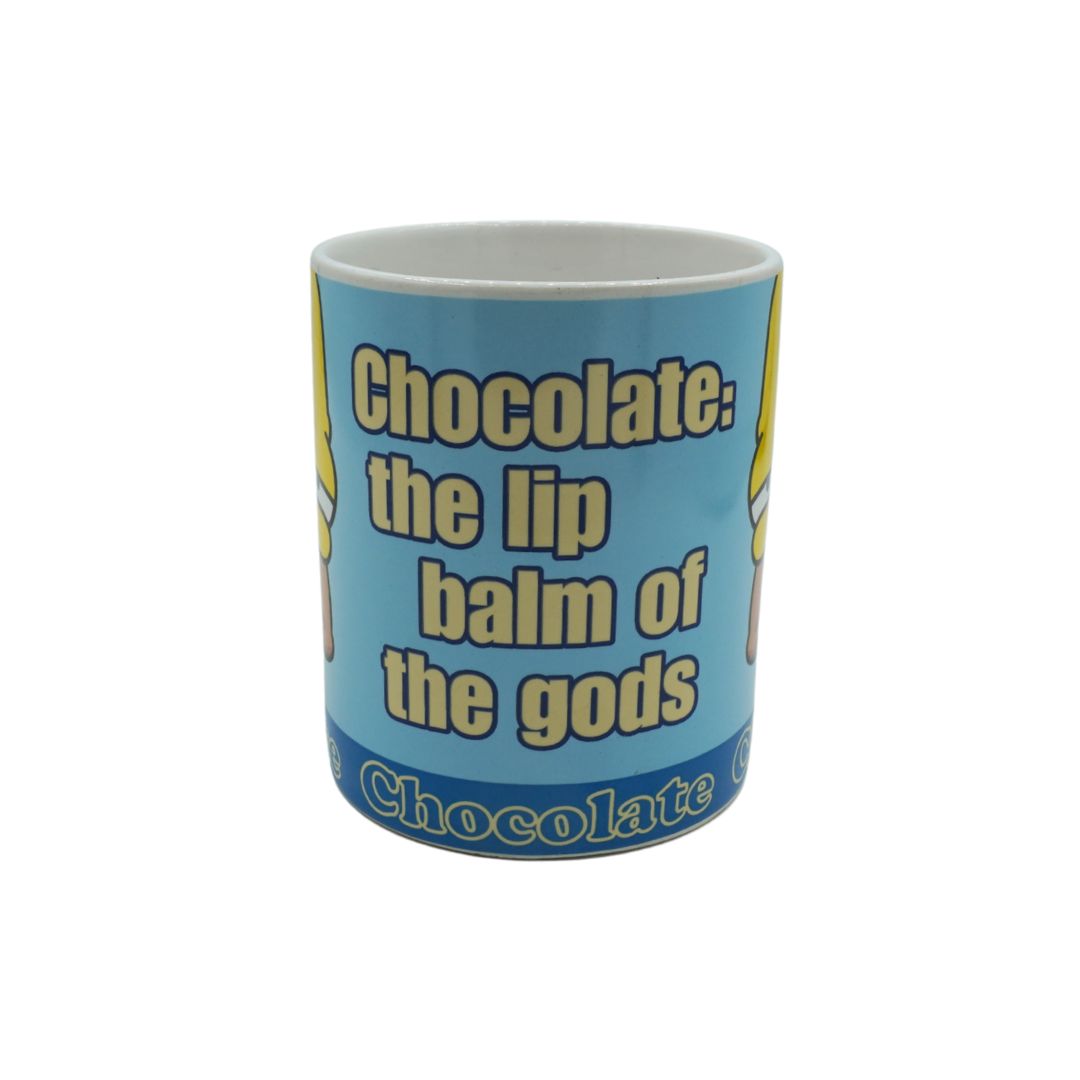 Blue mug with text 'Chocolate: the lip balm of the gods' on a white background