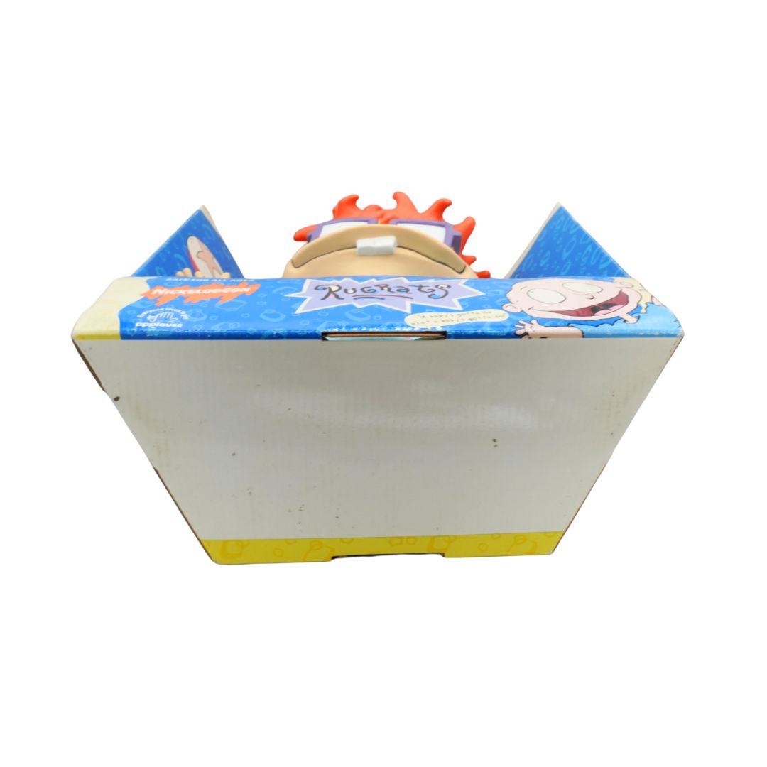 Cartoon character toy in a box on a white background