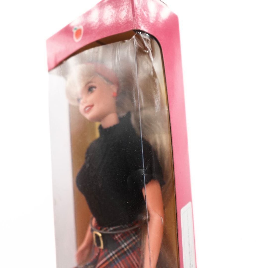 Photo showing damage to plastic membrane on the 1996 Classmate Barbie