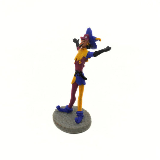 Colorful figurine of a character in a blue outfit with a white background