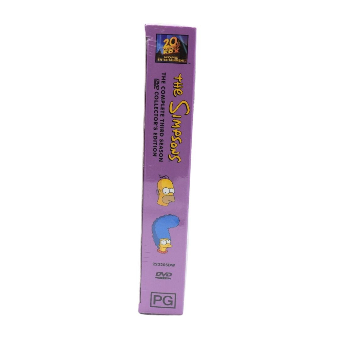 The Simpsons The Complete Third Season Collector's Edition DVD box set shown from the spine side, featuring a purple background with character illustrations of Homer and Bart Simpson.