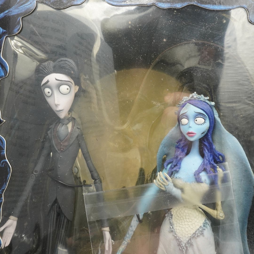 Close up of vintage Corpse Bride figurines, showing Emily and Victor