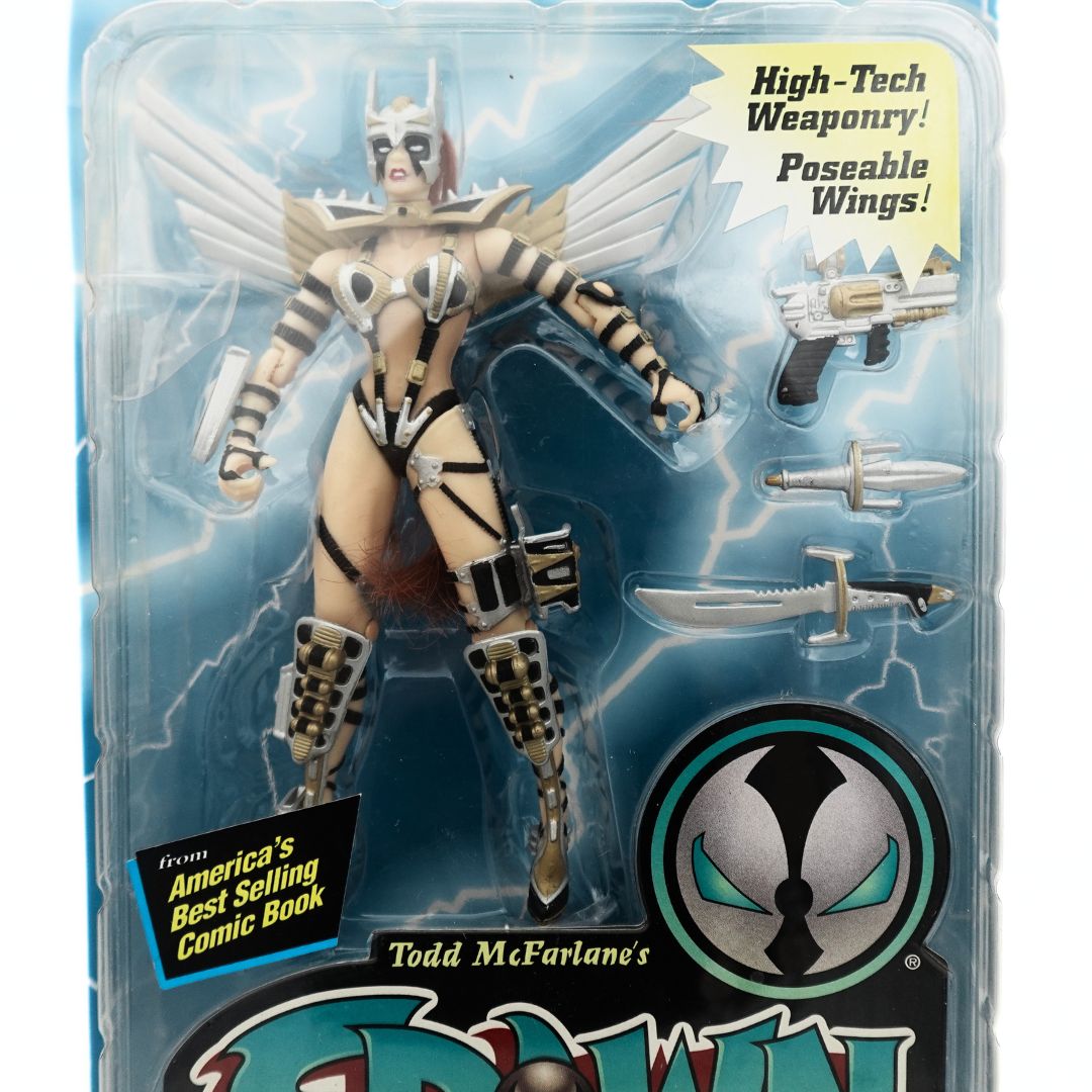 Closeup of the 1995 Cosmic Angela Spawn action figure showing the character, her wings and her weapons