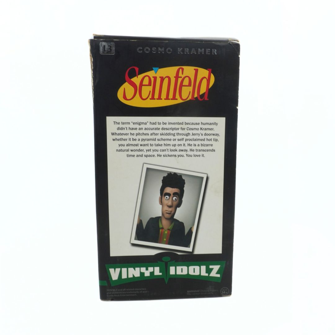 Seinfeld vinyl figure packaging with character image and text on a white background