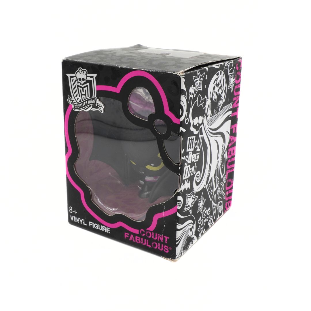 Black, pink and white Monster High toy on a white background
